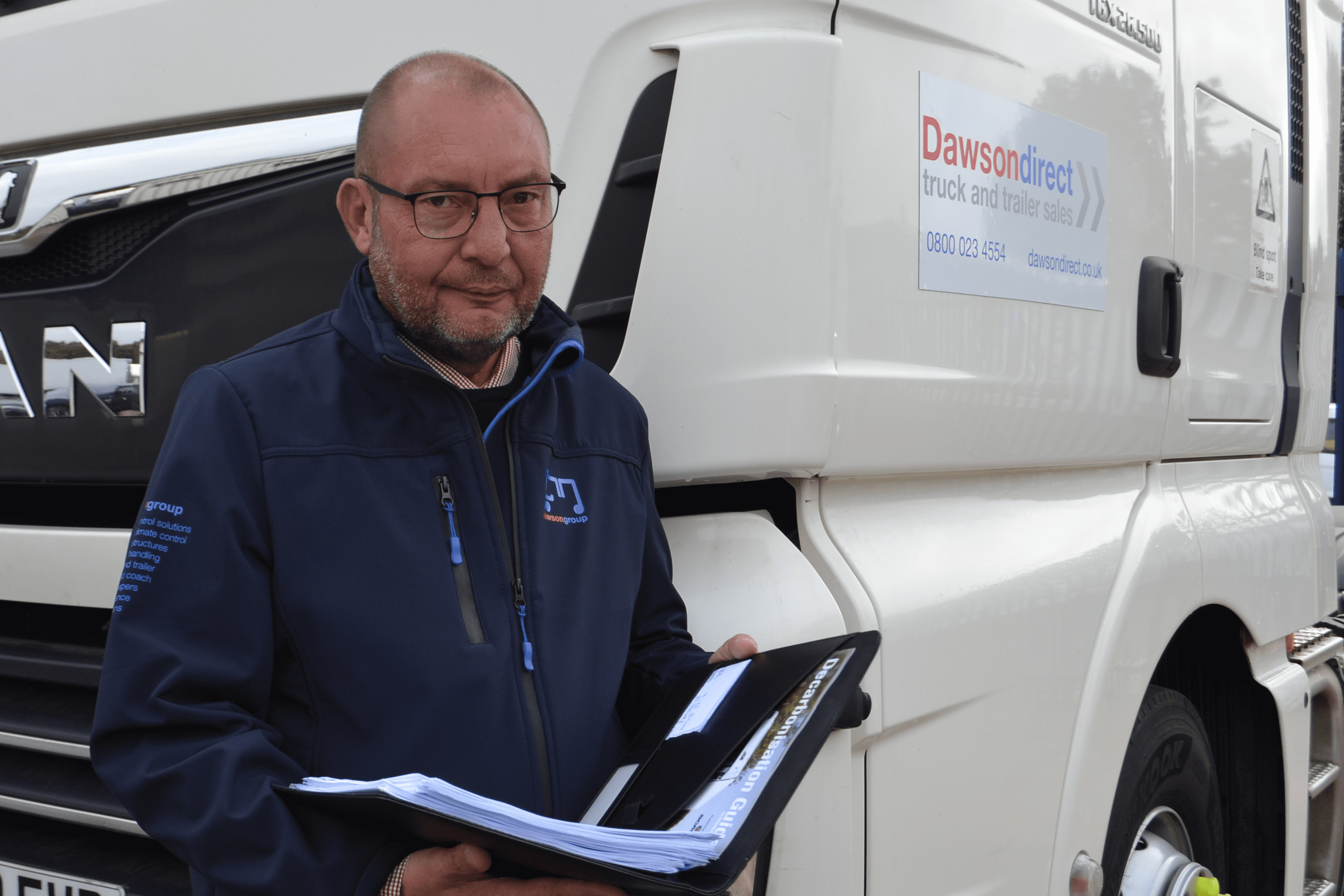 Guy Pinder in Front of a Truck